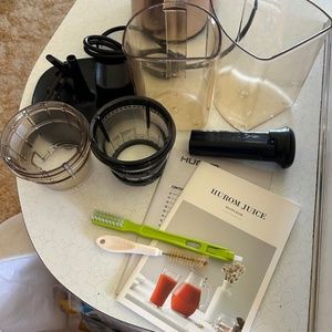 Hurom H-AA Slow Juicer attachments and booklets